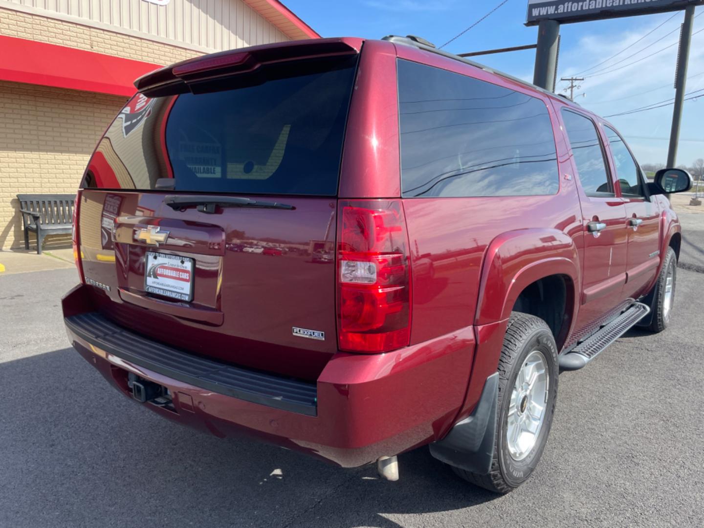 2008 Maroon Chevrolet Suburban 1500 (3GNFK16348G) with an V8, 5.3 Liter engine, Automatic, 4-Spd w/Overdrive transmission, located at 8008 Warden Rd, Sherwood, AR, 72120, (501) 801-6100, 34.830078, -92.186684 - Photo#7